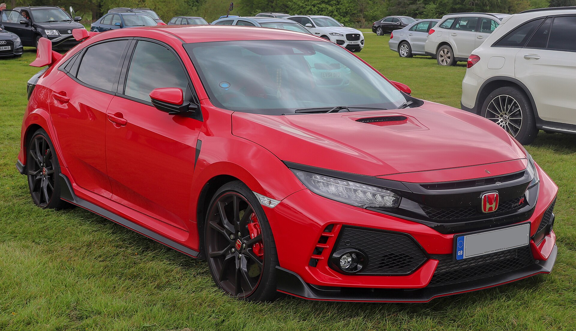 Honda Civic (hatchback / Tourer / sedan) X (FK/FC) (2017–2022) – front three-quarter view
